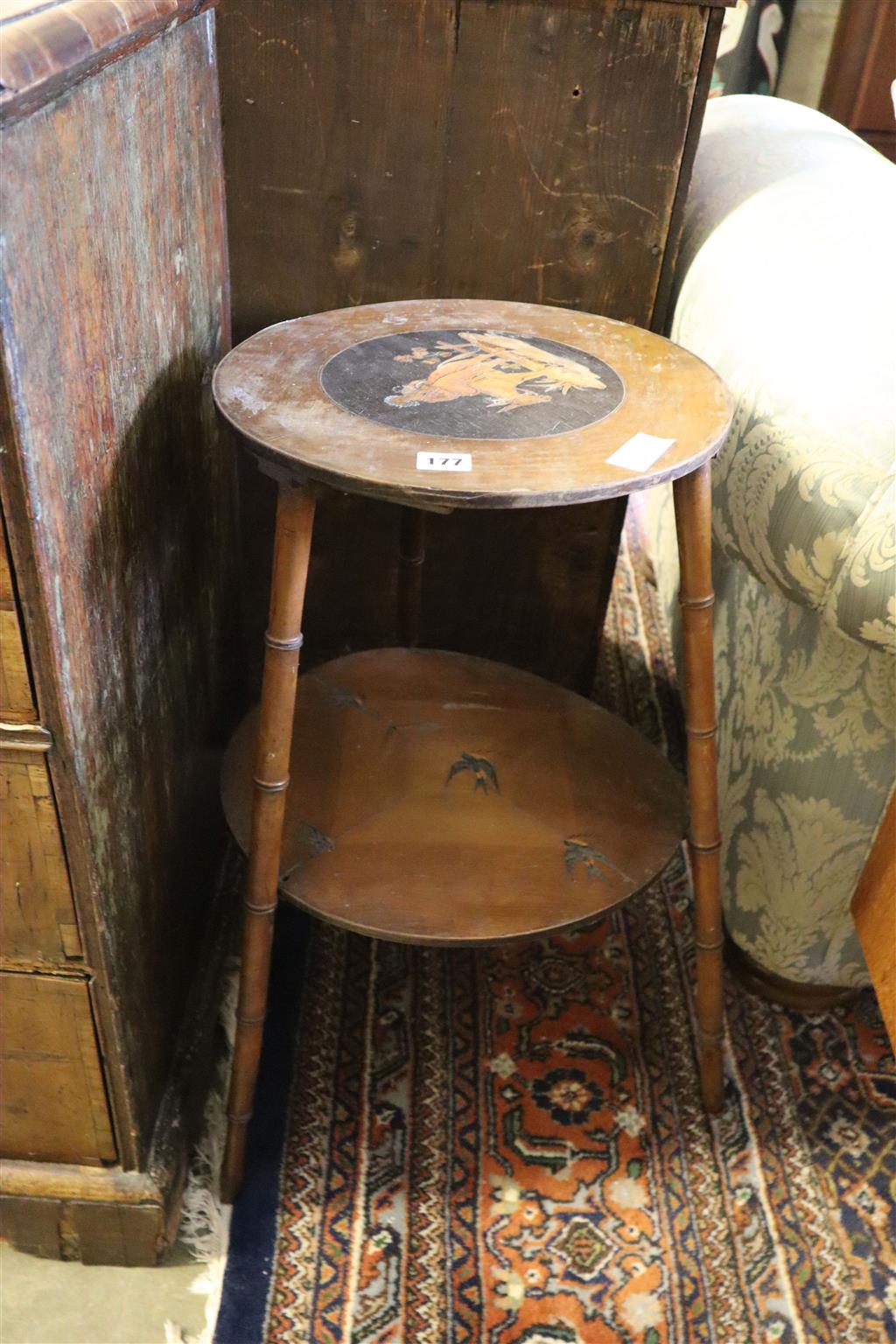 A 19th century Sorrento marquetry two tier occasional table, 40cm diameter, 69cm high